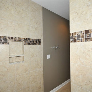 Large arts and crafts master beige tile and ceramic tile ceramic tile doorless shower photo in Indianapolis with shaker cabinets, beige cabinets, brown walls, an undermount sink and granite countertops