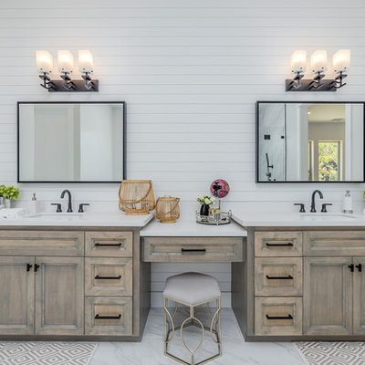 Inspiration for a cottage master gray floor and marble floor bathroom remodel in Sacramento with granite countertops, white countertops, recessed-panel cabinets, distressed cabinets, white walls and an undermount sink