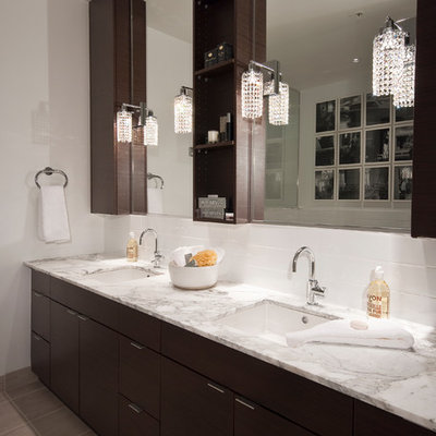 Inspiration for a contemporary bathroom remodel in Vancouver with an undermount sink, flat-panel cabinets and dark wood cabinets