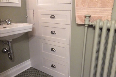 Small elegant 3/4 bathroom photo in Chicago with shaker cabinets and white cabinets