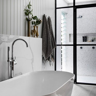 Design ideas for a modern bathroom in Sydney with a freestanding tub, white tile, porcelain tile, white walls, dark hardwood floors, brown floor, an open shower and white benchtops.
