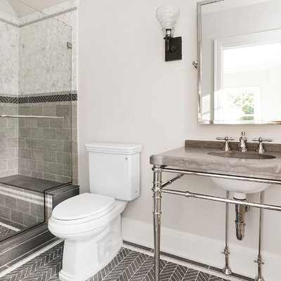 Inspiration for a mid-sized timeless white tile, gray tile and stone tile limestone floor alcove shower remodel in New York with a two-piece toilet, beige walls, marble countertops and a console sink