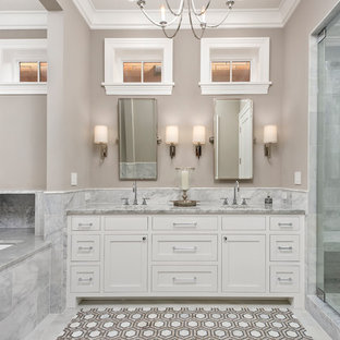 Transitional master alcove shower photo in Chicago with shaker cabinets, white cabinets, an undermount tub, beige walls, an undermount sink and a hinged shower door