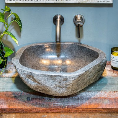 Inspiration for a small rustic 3/4 bathroom remodel in Boise with gray walls, a vessel sink and wood countertops