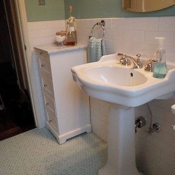 1940'3 bath room up date with glass penny round floor and white subway wall tile