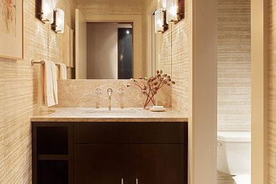 Bathroom - mid-sized 3/4 beige tile medium tone wood floor bathroom idea in Denver with flat-panel cabinets, dark wood cabinets, marble countertops and beige walls