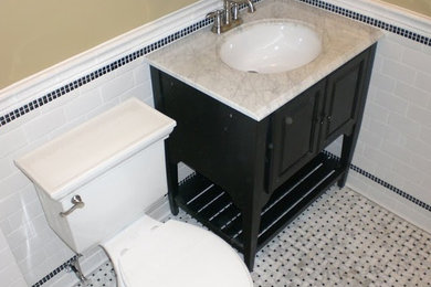 Bathroom - contemporary bathroom idea in Other with an undermount sink, open cabinets, dark wood cabinets, granite countertops and a two-piece toilet