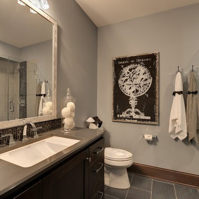 Inspiration for a timeless gray tile and mosaic tile alcove shower remodel in Minneapolis with an undermount sink, shaker cabinets and dark wood cabinets