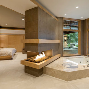 Design ideas for a large contemporary master bathroom in Minneapolis with porcelain floors and a hot tub.