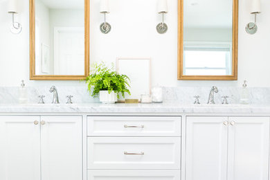 Inspiration for a coastal master white tile and subway tile marble floor corner shower remodel in Los Angeles with shaker cabinets, white cabinets, an undermount tub, white walls, an undermount sink and marble countertops