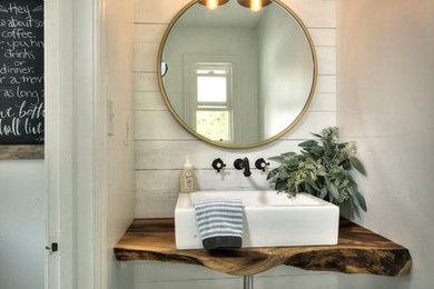 Mountain style 3/4 white tile ceramic tile bathroom photo in Sacramento with white walls, a vessel sink and wood countertops