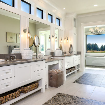 Bathroom - large farmhouse master ceramic tile and multicolored floor bathroom idea in Portland with shaker cabinets, white cabinets, gray walls, an undermount sink, a two-piece toilet, quartz countertops, a hinged shower door and white countertops