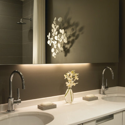 Trendy bathroom photo in Chicago with an undermount sink and white countertops