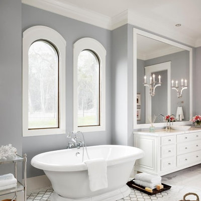Inspiration for a contemporary freestanding bathtub remodel in Austin with a vessel sink