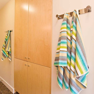8 towel hooks in poolside bathroom, built-in cabinet for towel storage
