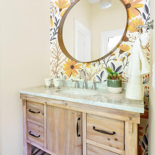 Inspiration for a mid-sized country kids bathroom in San Francisco with flat-panel cabinets, brown cabinets, a claw-foot tub, multi-coloured tile, multi-coloured walls, porcelain floors, an integrated sink, marble benchtops, multi-coloured floor, grey benchtops, an enclosed toilet, a freestanding vanity, wood and wallpaper.