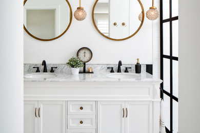 Example of a mid-sized classic master white tile and subway tile marble floor alcove shower design in San Francisco with white cabinets, white walls, an undermount sink, recessed-panel cabinets, a two-piece toilet and marble countertops