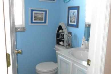 Example of an eclectic bathroom design in Raleigh