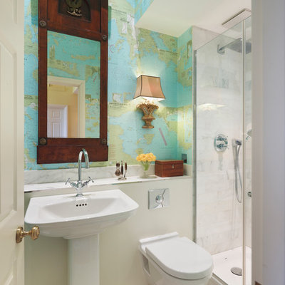 Example of a trendy white tile mosaic tile floor alcove shower design in London with a pedestal sink, a wall-mount toilet and multicolored walls
