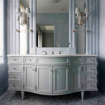 A freestanding curved-front vanity