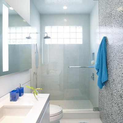 Example of a trendy multicolored tile alcove shower design in Miami with an undermount sink, flat-panel cabinets and white cabinets