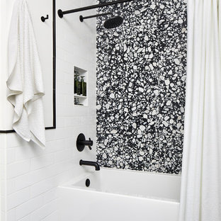 Inspiration for a small modern kids' alcove bathtub remodel in DC Metro with flat-panel cabinets, white cabinets, a one-piece toilet, white walls and quartzite countertops