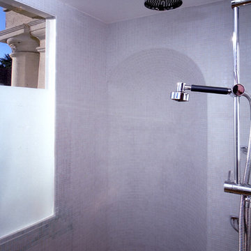 A Mosaic Tiled Shower with a Niche