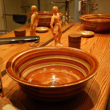 A pair of custom Stoneware Sinks in Honey Rose glaze from E. C. Racicot Art Sink