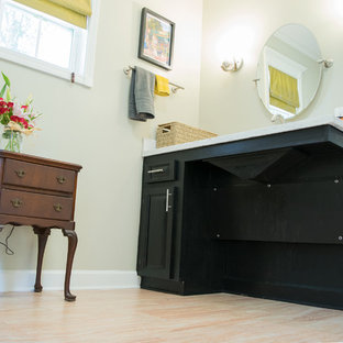 Photo of a mid-sized traditional master bathroom in New Orleans with black cabinets, a curbless shower, a two-piece toilet, green walls, cork floors, granite benchtops and beige floor.