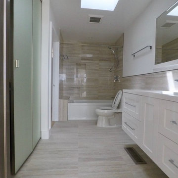 Hallway bathroom with new skylight.