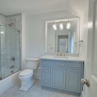 Small transitional kids' multicolored tile and marble tile marble floor and multicolored floor bathroom photo in Philadelphia with flat-panel cabinets, gray cabinets, a one-piece toilet, white walls and marble countertops