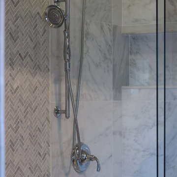 Adjustable Shower Head in Marble Tiled Shower