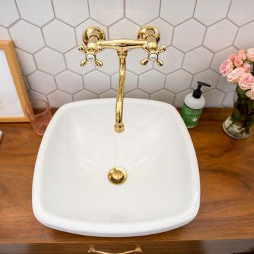 After - close-up of new sink and wall-mount faucet (also from Kingston Brass)