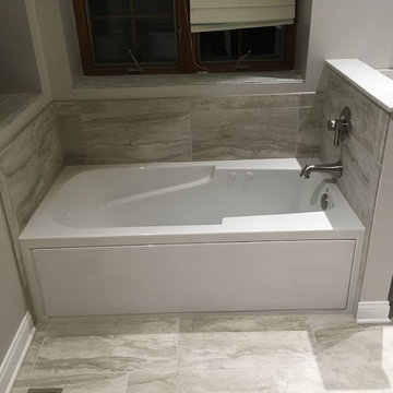 Alcove Air Tub with Tile Surround and Integral Skirt