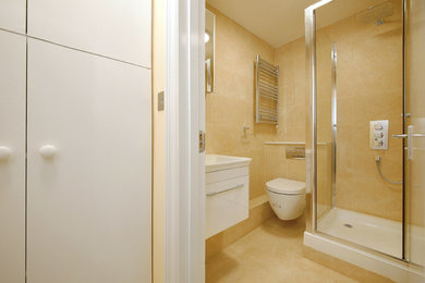 Design ideas for a small modern ensuite bathroom in London.