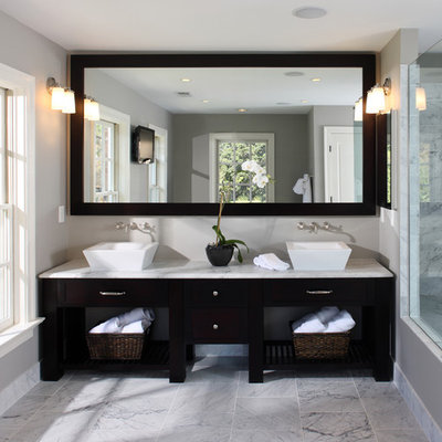 Bathroom - transitional marble tile bathroom idea in DC Metro with marble countertops and a vessel sink