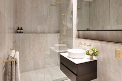 Design ideas for a small ensuite bathroom in Adelaide with grey tiles, porcelain tiles, grey walls, porcelain flooring, grey floors, freestanding cabinets, dark wood cabinets, a walk-in shower, quartz worktops and white worktops.