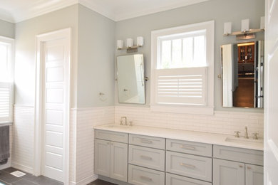 Bathroom - large transitional master white tile and subway tile ceramic tile bathroom idea in Atlanta with recessed-panel cabinets, gray cabinets, an undermount sink, marble countertops, gray walls and a one-piece toilet