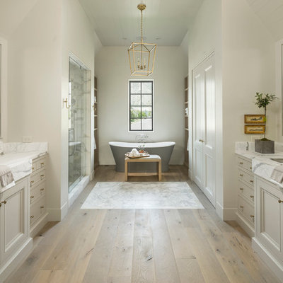 Example of a classic master light wood floor bathroom design in Salt Lake City with gray cabinets, white walls, an undermount sink and recessed-panel cabinets