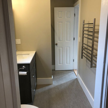 Apartment bath with towel warmer