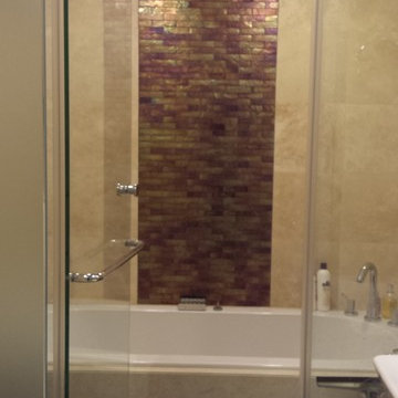 Apartment in Hampton Wick, TW11: En-suite combined bath and shower enclosure
