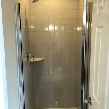 Apartment shower with subway tile