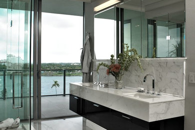 Bathroom - large contemporary master white tile and stone slab bathroom idea in Miami with an undermount sink, flat-panel cabinets, dark wood cabinets and quartzite countertops