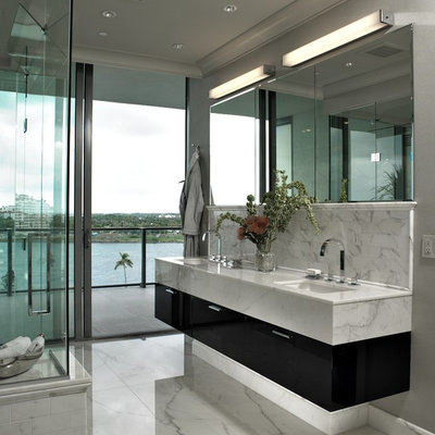Bathroom - large contemporary master white tile and stone slab bathroom idea in Miami with an undermount sink, flat-panel cabinets, dark wood cabinets and quartzite countertops