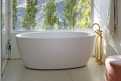 Freestanding bathtub - mid-sized scandinavian master freestanding bathtub idea in Miami with white cabinets