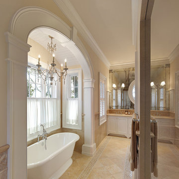 Arch accenuates tub in Master Bath