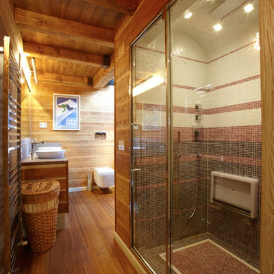 Corner shower - large rustic 3/4 medium tone wood floor corner shower idea in Sydney with medium tone wood cabinets, a wall-mount toilet and a vessel sink