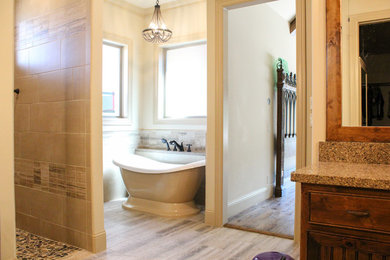 Bathroom - large traditional master gray tile and porcelain tile porcelain tile and brown floor bathroom idea in Dallas