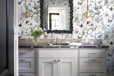 Inspiration for a mid-sized transitional 3/4 dark wood floor and brown floor bathroom remodel in Charleston with shaker cabinets, white cabinets, an undermount sink, multicolored walls, marble countertops and black countertops