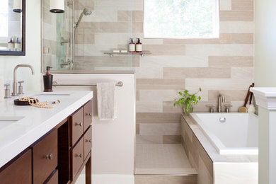 Example of a large transitional master beige tile bathroom design in DC Metro with medium tone wood cabinets